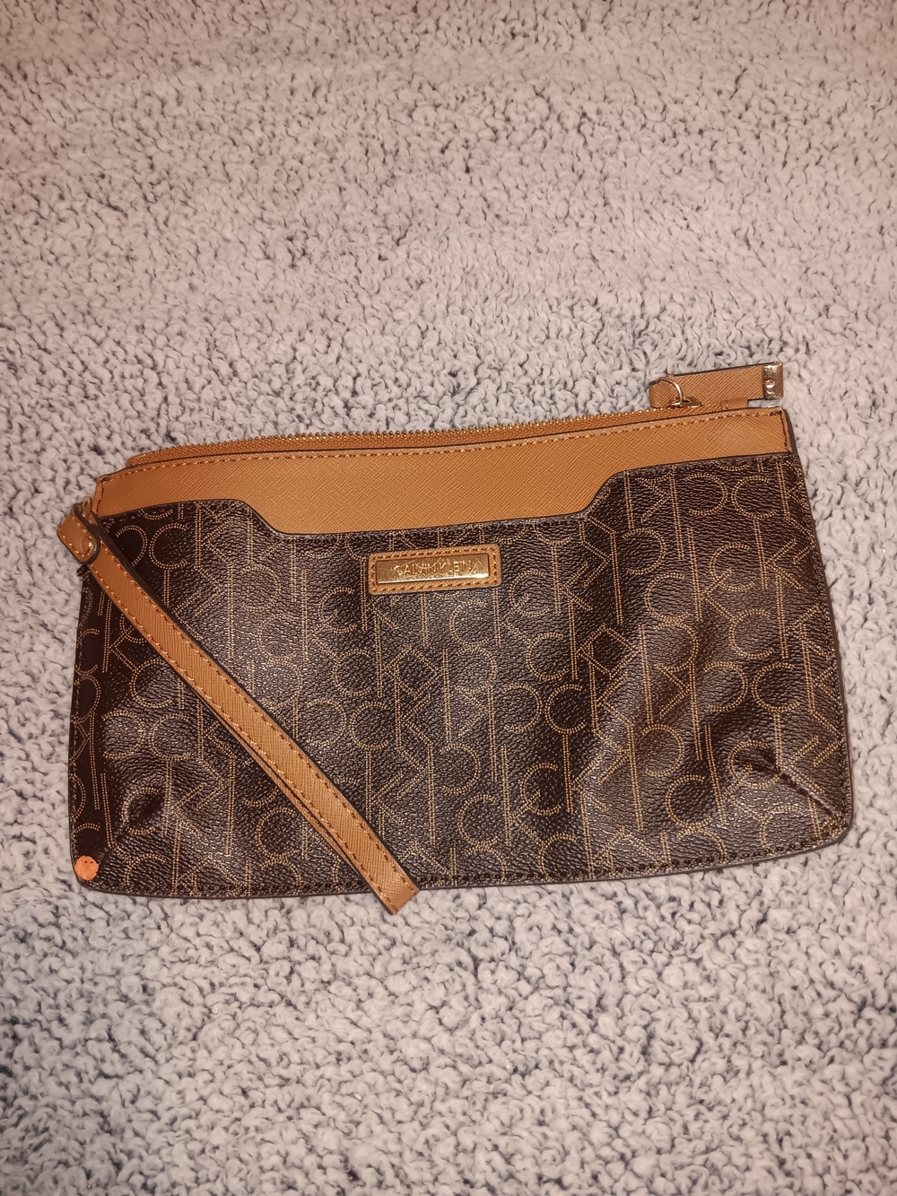 Authentic Calvin Klein Brown Monogram Wristlet with Tan Trim